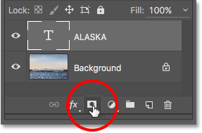Adding a layer mask to the Type layer in Photoshop. 