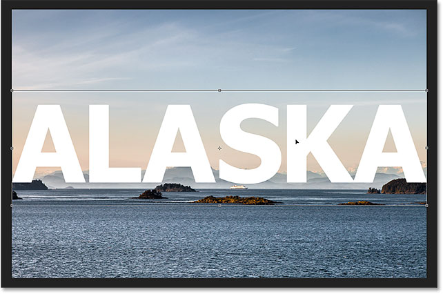 Resizing and moving the text with Free Transform in Photoshop. 