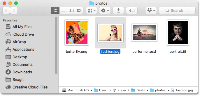 Opening of of the photos in the Finder window. Image © 2016 Photoshop Essentials.com