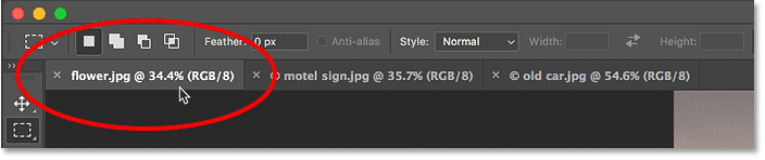Switching between open images by clicking the tabs.