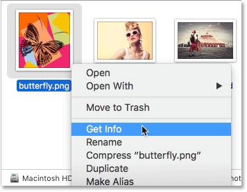Control-clicking on the PNG file and choosing Get Info.