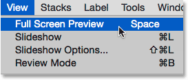 Selecting the Full Screen Preview option under the View menu in Adobe Bridge. Image © 2015 Photoshop Essentials.com