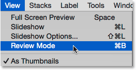 Selecting Review Mode from under the View menu in Adobe Bridge. Image © 2015 Photoshop Essentials.com