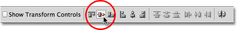 The Align Vertical Centers option in the Options Bar in Photoshop. 