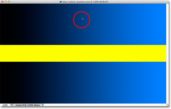 Clicking in the middle of the gradient with the Eyedropper Tool. 