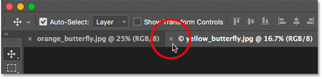 Closing a single tabbed document in Photoshop.