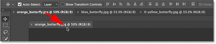 Dragging a tab away from the others to create a floating document window.