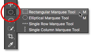 Selecting the default tool from behind the previously selected tool in the Photoshop Toolbar.
