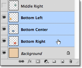 Selecting three layers at once in the Layers panel in Photoshop. 