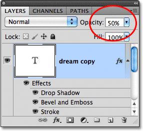 Lowering the Opacity of the text to 50%, with layer styles applied to the text.