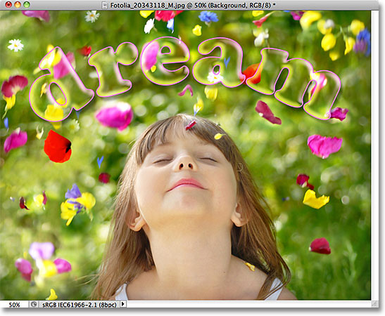 The text is now 100% transparent while the layer styles remain 100% visible.